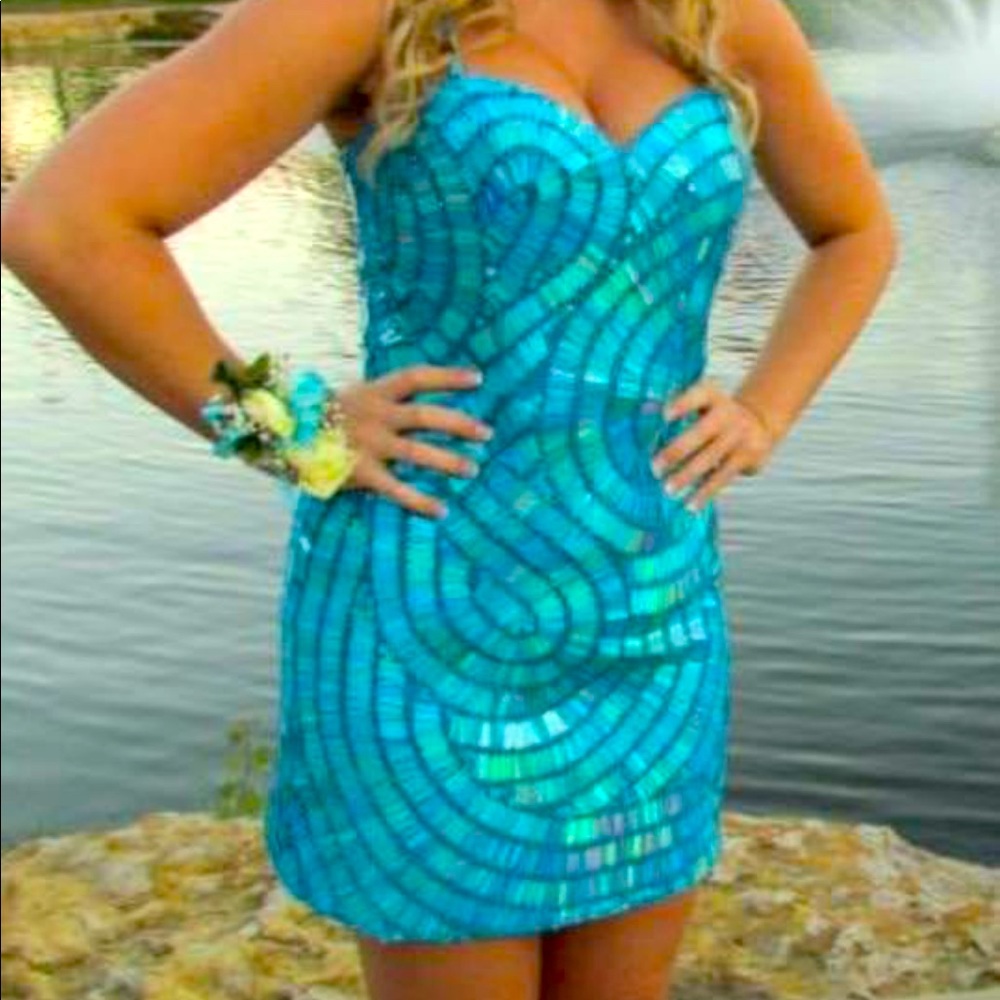 Teal sequin special occasion dress, size 3 but normally size 4.